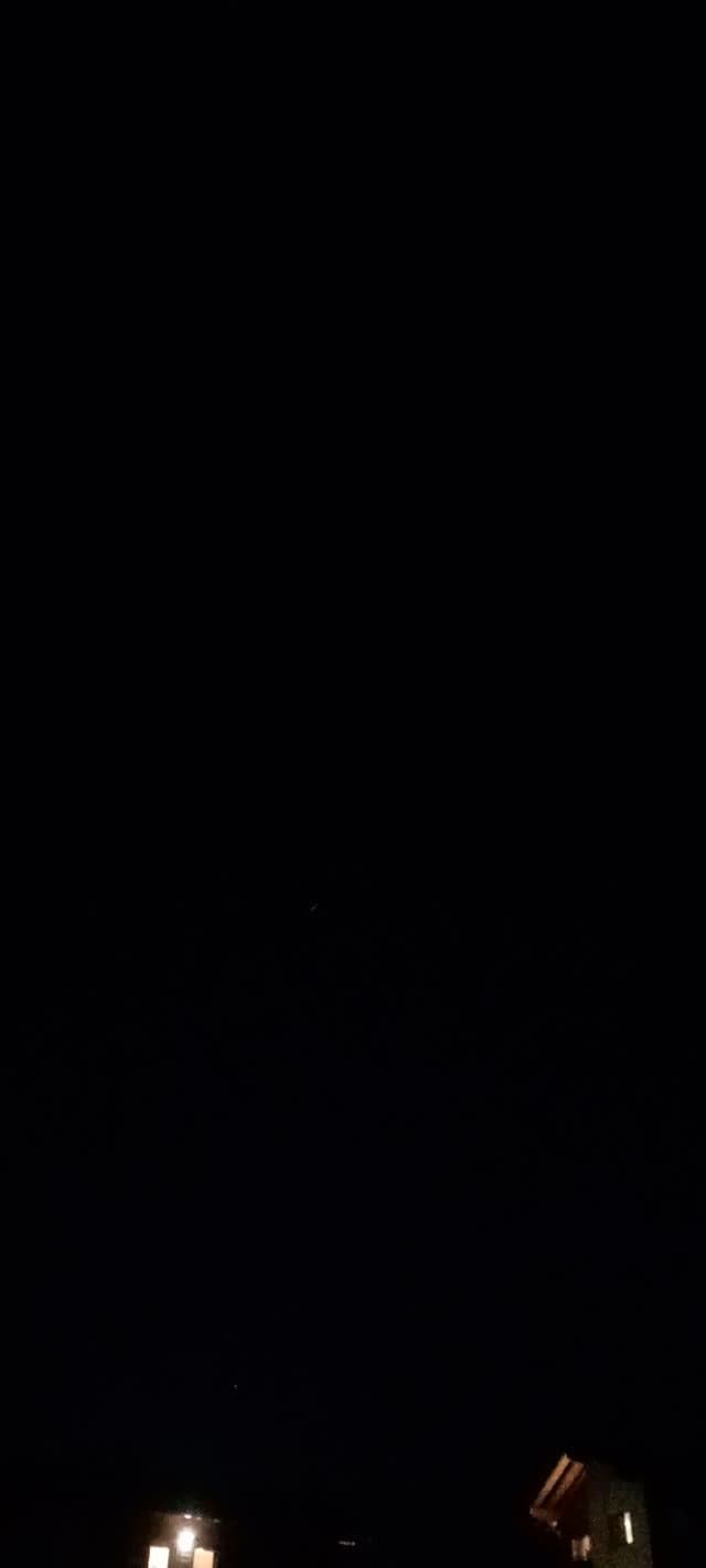Line of lights filmed crossing the night sky over Trepalle, Italy